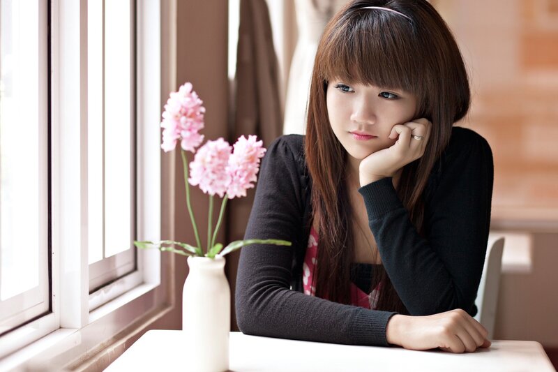 Young Woman at Table — Black