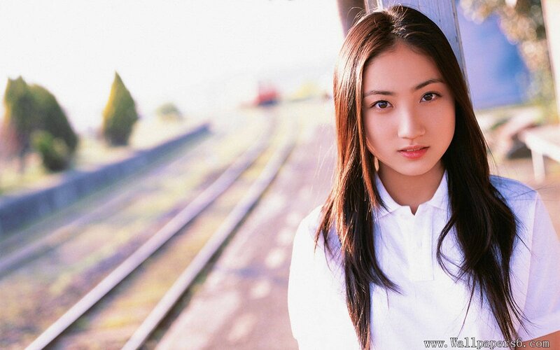 Young Woman at Train Station