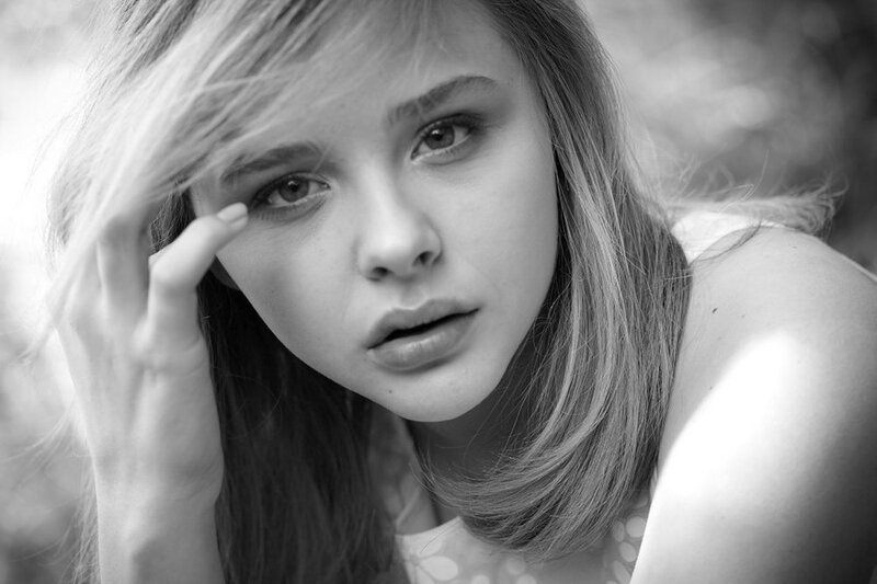 Young Woman in Black and White — Contemplative