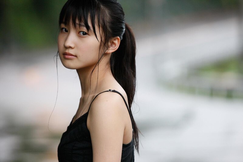 young woman in black top