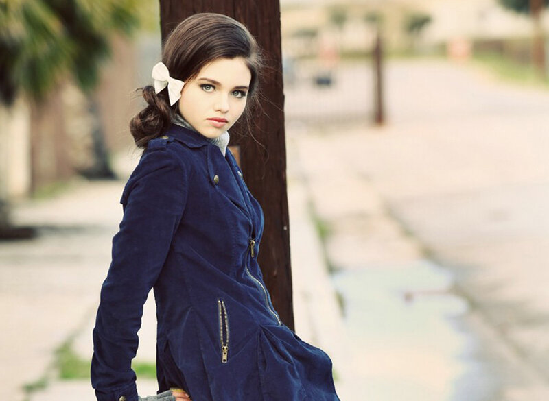 Young Woman in Blue Coat