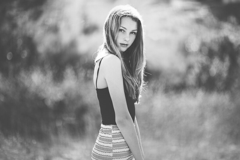 Young Woman in Field — Black