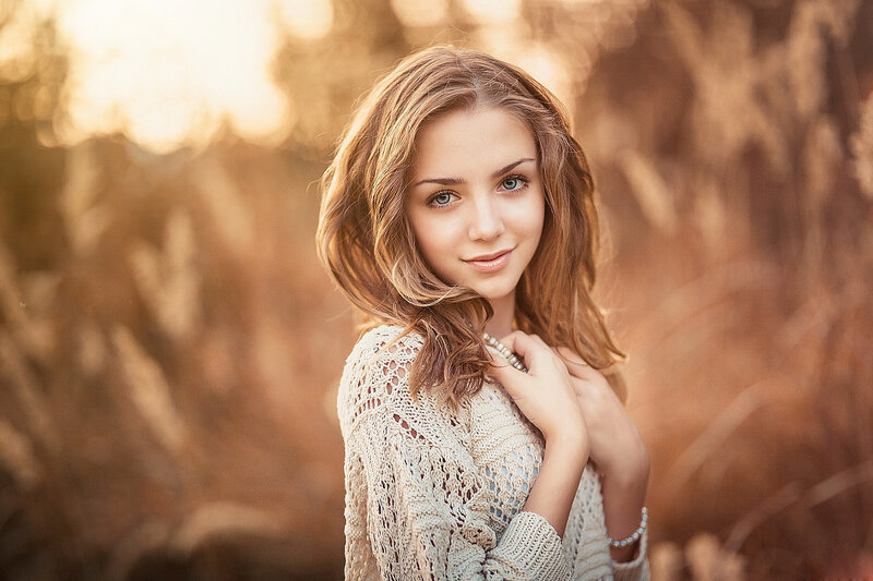Young Woman in Field — Brown, Serene