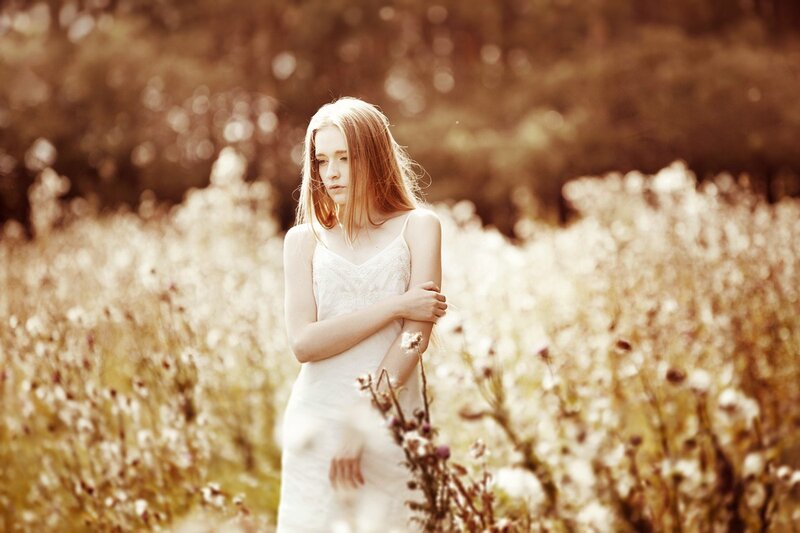 Young Woman in Field — White