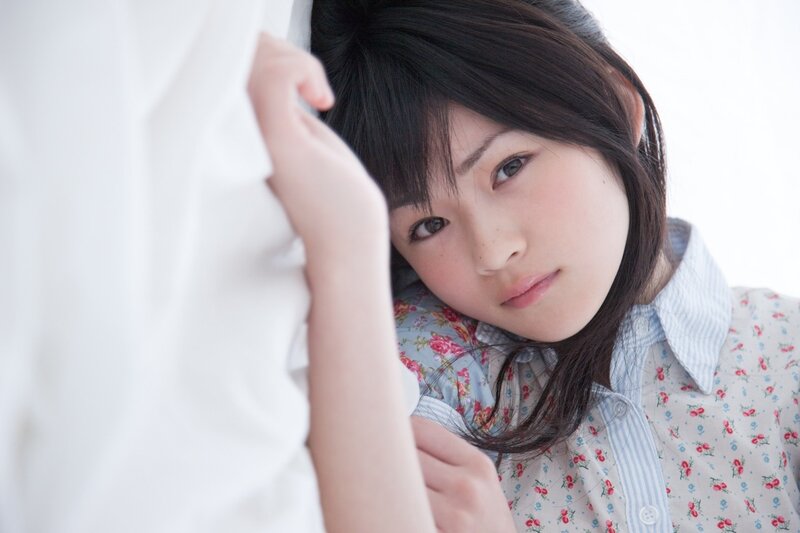 Young Woman in Floral Shirt — White, Calm