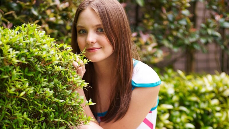 Young Woman in Garden