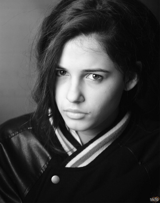Young Woman in Jacket — Black, Serious
