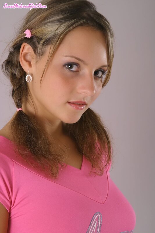 Young woman in pink shirt