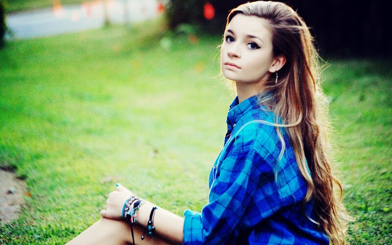 Young Woman in Plaid Shirt — Blue, Contemplative, Afternoon