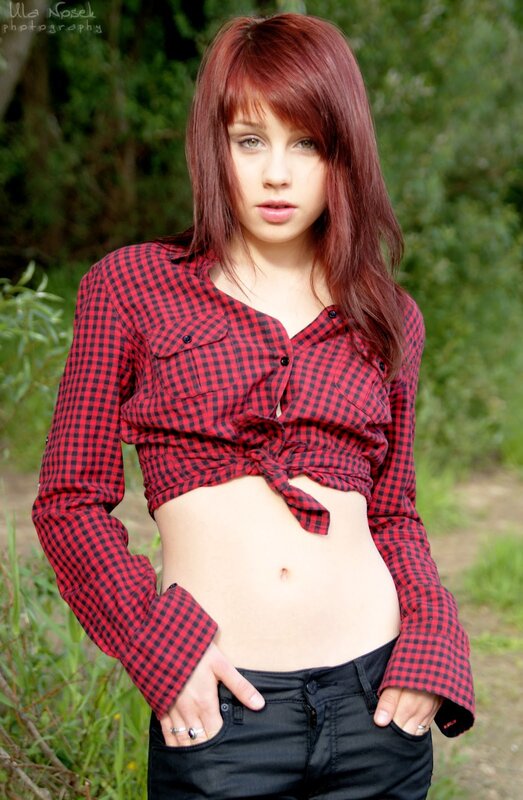 Young Woman in Plaid Shirt — Red, Natural