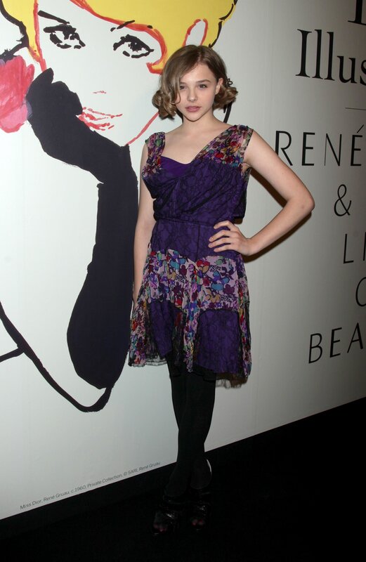Young woman in purple dress