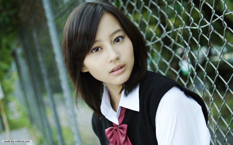 young woman in school uniform
