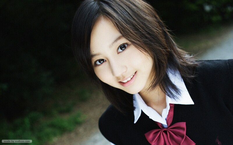 young woman in school uniform