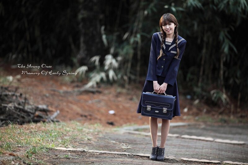 Young woman in school uniform