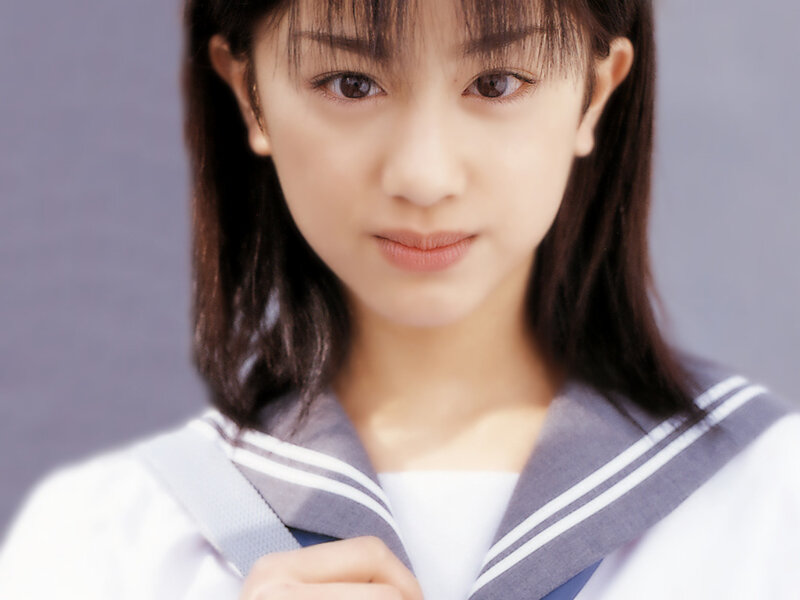young woman in school uniform