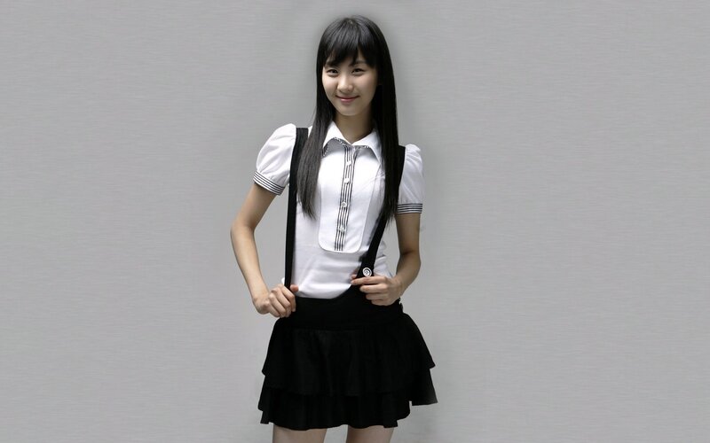 Young Woman in School Uniform — White