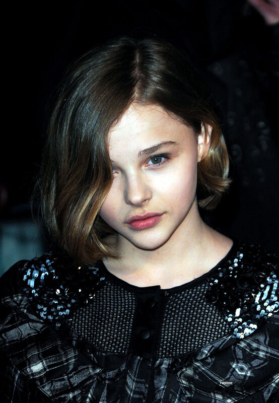 young woman in sequined top