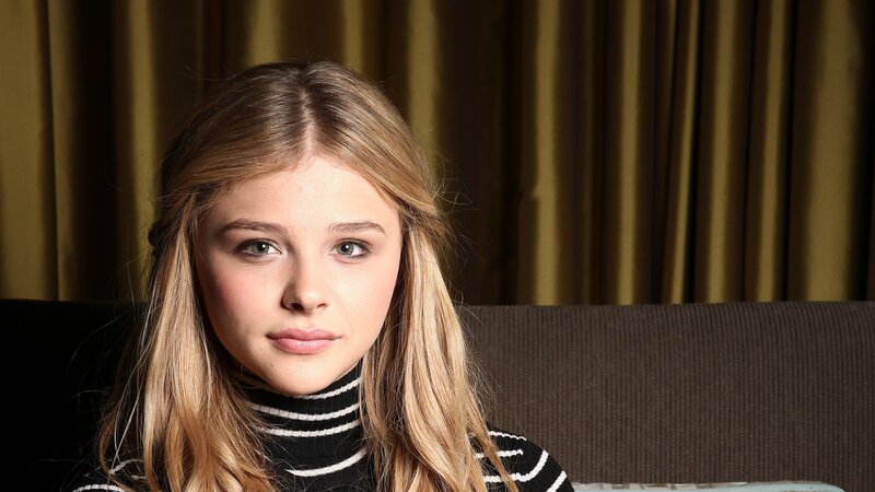 young woman in striped sweater