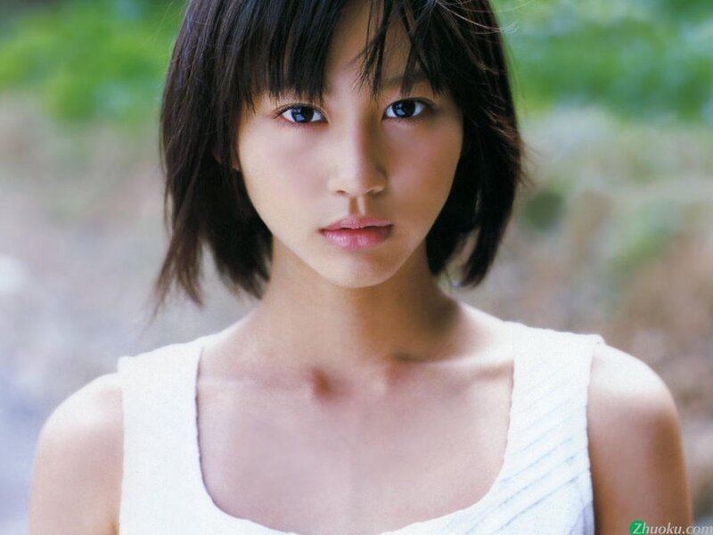 young woman in white top
