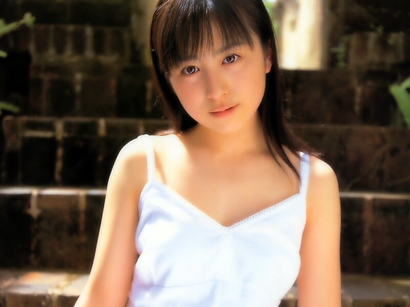 young woman in white top