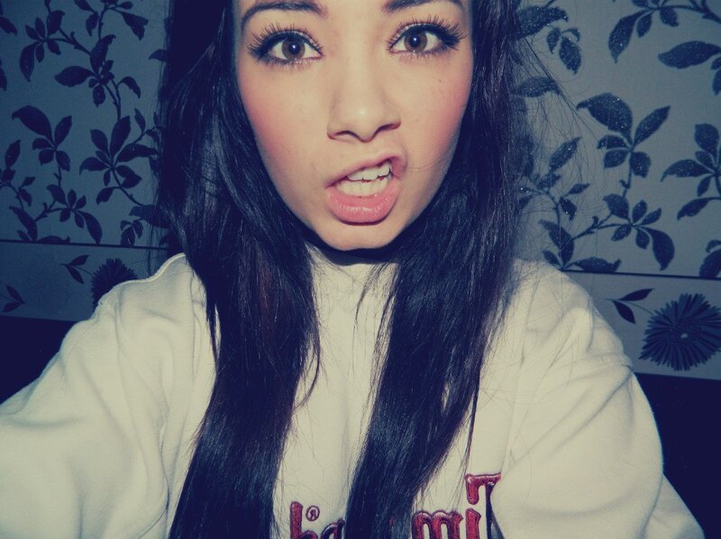 Young Woman Making Face — White