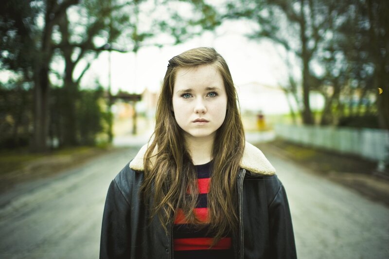 young woman on a quiet street