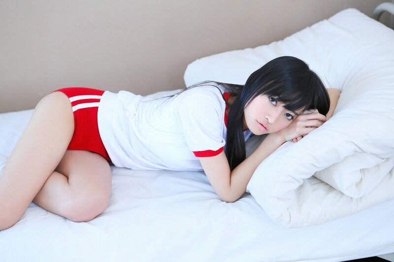 Young Woman on Bed — White, Calm, Photograph, Pillow, Shorts