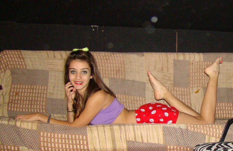 Young Woman on Couch — Purple