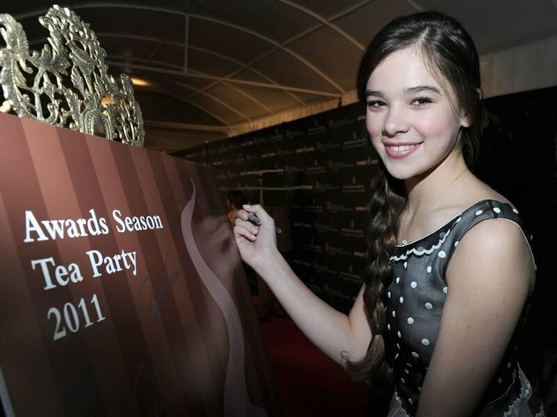 Young Woman Signing Board