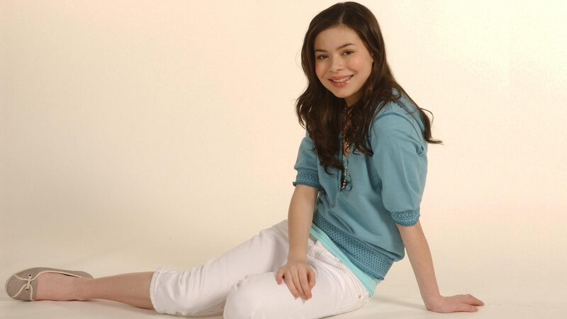 Young Woman Sitting on Floor