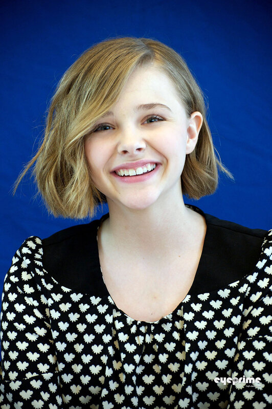 young woman smiling at camera
