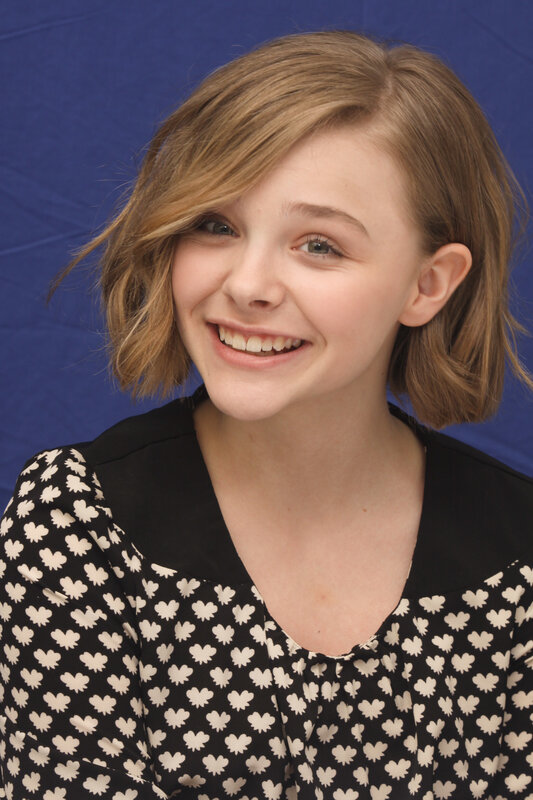 young woman smiling at camera