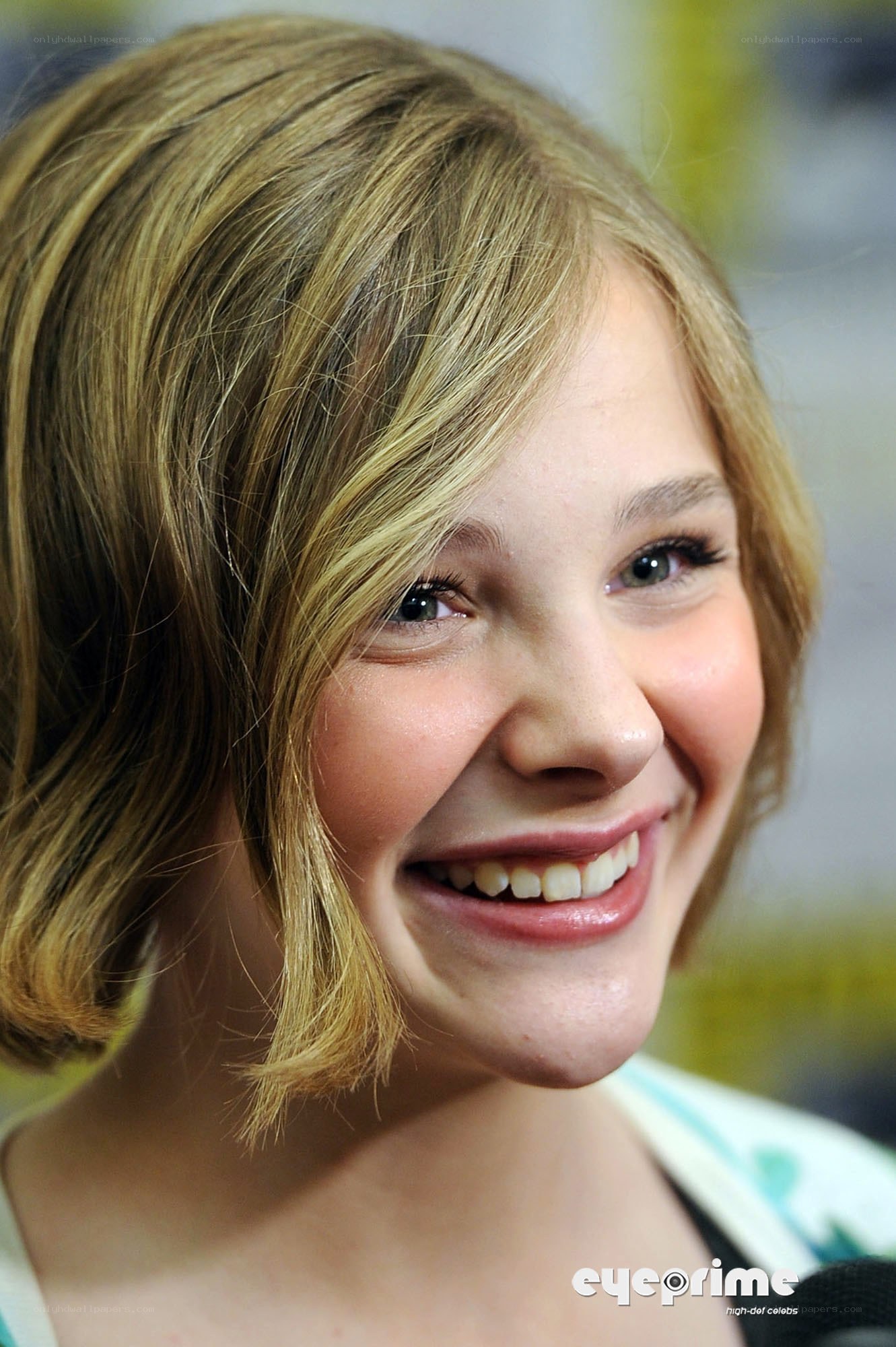 young woman smiling at event