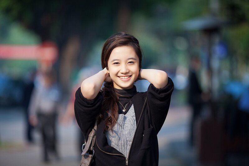Young Woman Smiling — Black, Happy, Afternoon, Photograph, Trees