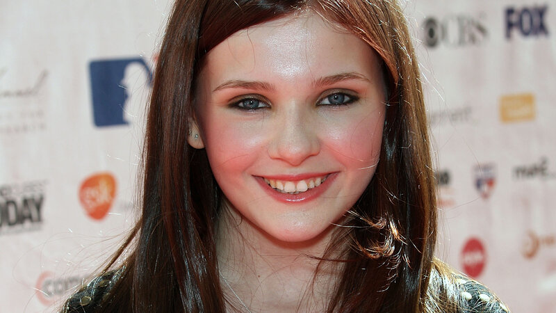 Young Woman Smiling — Brown, Happy