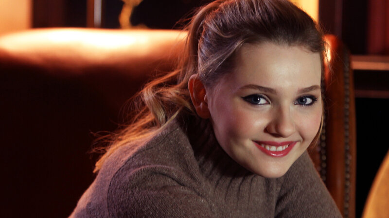 Young Woman Smiling — Brown
