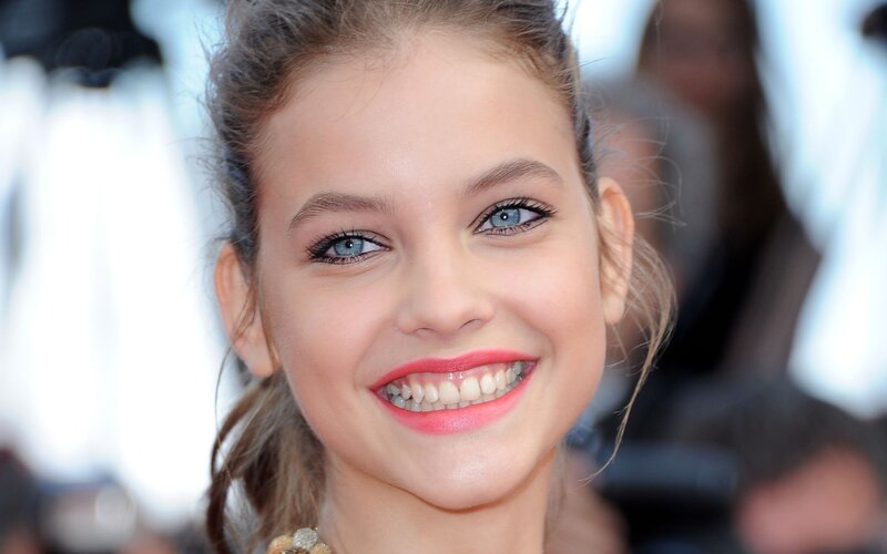 Young Woman Smiling — Pink
