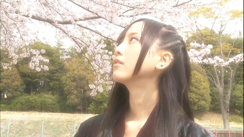 Young Woman under Cherry Blossoms
