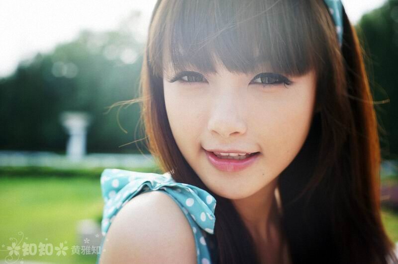 Young Woman with Bangs — Blue