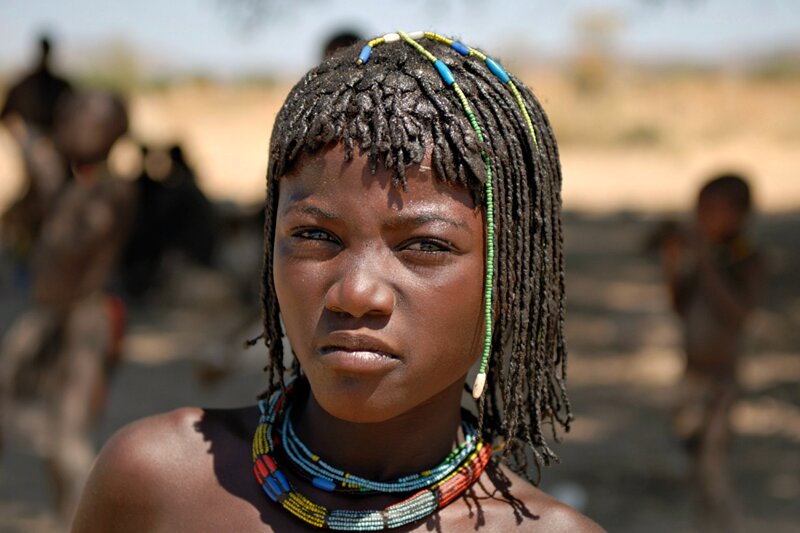 Young Woman with Beaded Necklaces