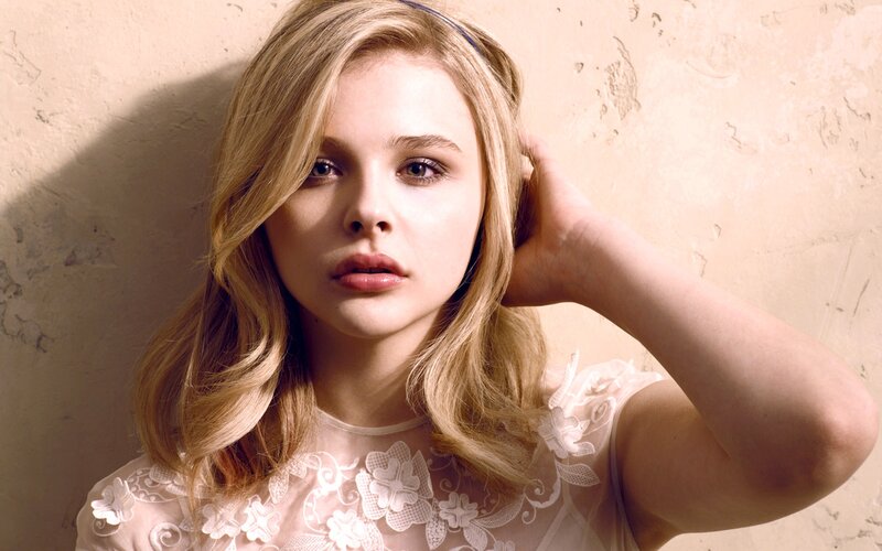 Young Woman with Blonde Hair — Beige, Dramatic