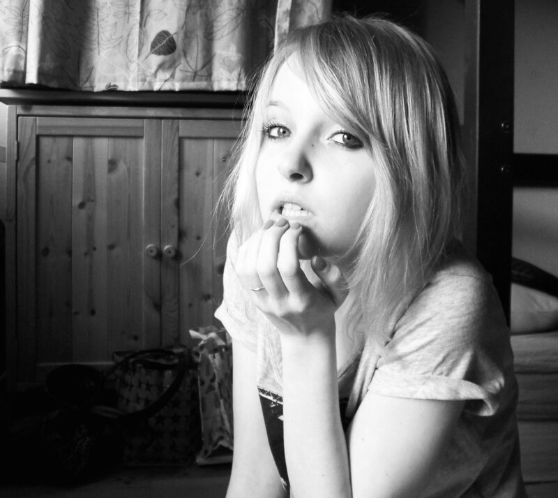 Young Woman with Blonde Hair — Black, Contemplative
