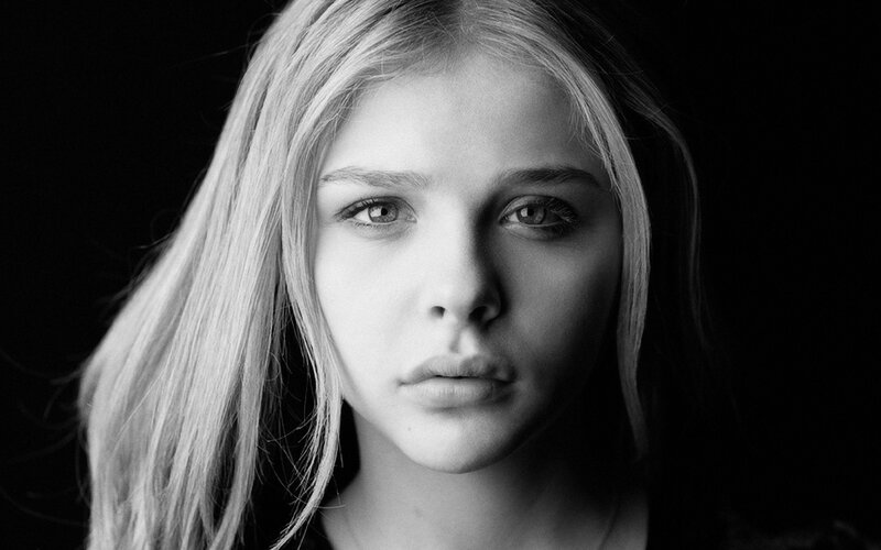 Young Woman with Blonde Hair — Black, Dramatic, Photograph