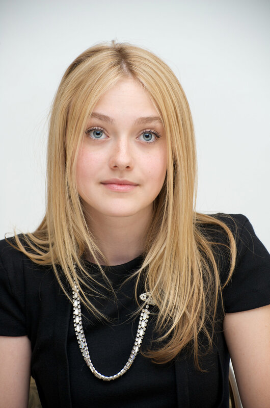 Young Woman with Blonde Hair — Black, Neutral, Photograph, Black Shirt, Necklace, Blue Eyes, White