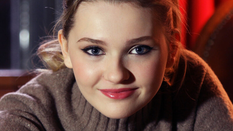 Young Woman with Blue Eyes — Brown, Calm, Photograph