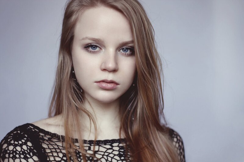 Young Woman with Blue Eyes — Gray, Neutral