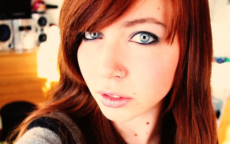 Young Woman with Blue Eyes — Red, Neutral