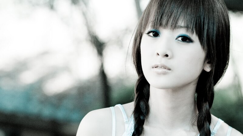 Young Woman with Braids — Black