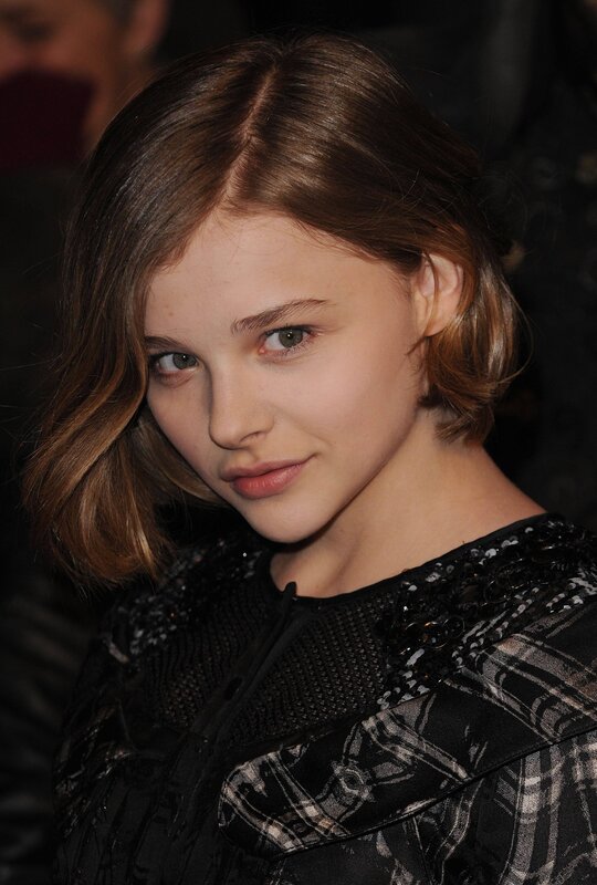 Young Woman with Brown Hair — Black, Neutral, Photograph