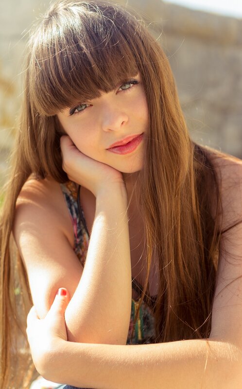 Young Woman with Brown Hair — Calm, Afternoon, Photograph, Hand, Tank Top